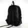City backpack on a zipper, black color
