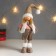 Interior doll "Boy in a white vest and beige cap" 48x10x15 cm