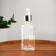 A bottle for storage, with a pipette, 50 ml, silver/white color
