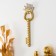 Panel interior polystone "twisted key with a crown" gold with a white patina 5.5x1x17 cm