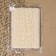 Knitted lace, 25 mm × 10 ± 1 m, beige color