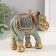 Souvenir Polystone "Elephant, chamomile on the Propon" red-blue, sparkle 15x6x12.5 cm