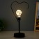 The desktop "Heart" LED from batteries 3haa black 11x16.5x36.4 cm Risalux