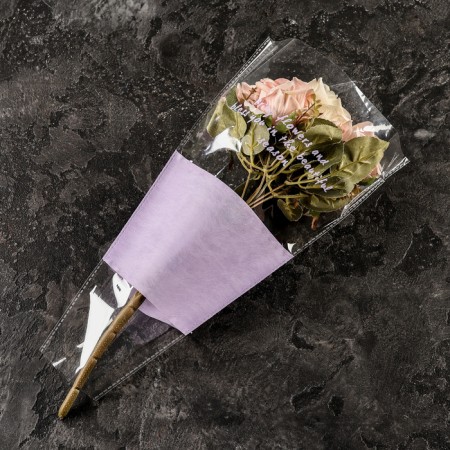 Packet stoop for flowers, with non -woven material, 26+7x37 cm, lilac