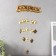 Music Music Metal, Polystone "Seven Elephants on the Bosk" 9 bells 44x21 cm
