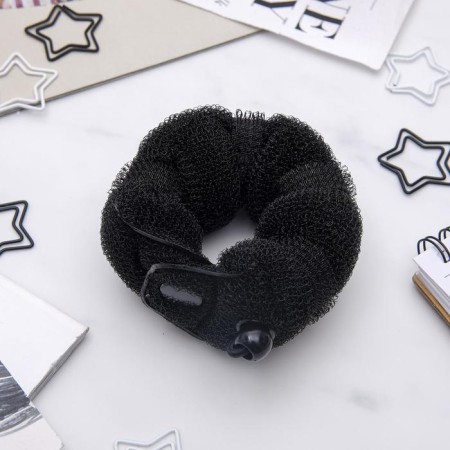 A roller with a mount and an elastic band for creating a bundle, 5x22.5 cm, black