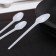 A spoon of a single -plastic disposable, 12.5 cm, white color
