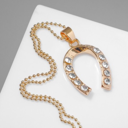 Piece "horseshoe", white color in gold, 45 cm