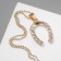 Piece "horseshoe", white color in gold, 45 cm