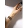 Bracelet with rhinestones "ice" 5 rows, white color in gold, d = 7.5 cm