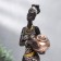 Polystone souvenir "African with a jug, in a dress with silver flowers" mix 25.5x7x5 cm