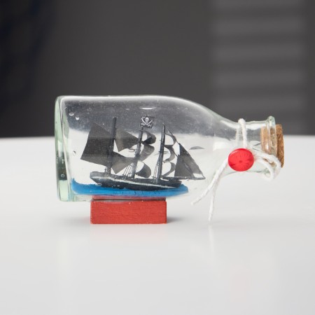 Souvenir ship in a bottle 15x4x6cm, black-4
