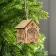 Christmas tree toy "House with a deer", from batteries, a glow of warm white