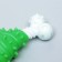Two -layer toy (hard and soft plastic) "lower leg", 12 cm, green
