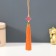 Suspension textiles, plastic "Knot of happiness and infinity" Orange 0.7x1x9.5 cm