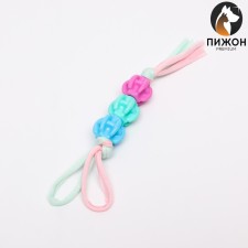 A toy of three beads on the rope 