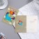 Postcard "Let in every day be a little magic" Lak Twin, 12.1x18.3 cm