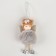 Doll in the show "Fairy" with a bow