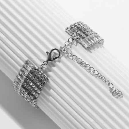 Bracelet with rhinestones "Illusion" asymmetry, white color in silver-1
