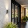 Faced wall lamp with an IP44 2x7W movement sensor