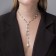 The necklace with pearls “chain” improvisation, ball No. 8, white color in silver, l = 40 cm