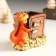 Souvenir Polystone Pencil "Dragon at the safe with coins" 7.5x6.5x7.5 cm