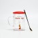 A mug with a spoon and a lid of the "Happy New Year", 470 ml