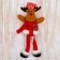 Soft suspension "Deer in a suit with ornaments, long legs" 8x24 cm, red