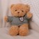 Soft toy "Bear" in a jacket, 28 cm, beige color