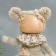 Interior doll "Baby in a beige outfit, a skirt from a mesh" 33x15x18.5 cm