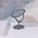 The mirror is desktop, bilateral, with an increase, D mirror surface 9.7 cm, silver color