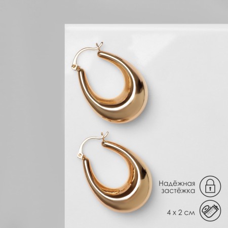 Earrings Metal are “wide” volumetric, color gold
