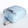A backpack with a zipper, the color is blue