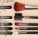 A set of makeup brushes, 5 objects, black/pink gold color