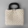 Handles for bags are wooden, wicker, d = 9.8 × 5.9 / 13.5 × 9.5 cm, 2 pcs, black color