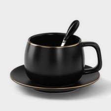 Tea couple ceramic with a spoon 