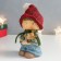 Souvenir Polystone "Boy in a red cap with a deer in his hands" 10x8.5x16 cm