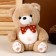 Soft toy "Bear", with a bow in peas, 26 cm, beige color