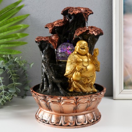 A desktop fountain with a “golden hotel from a tree with a fountain” 20.5x20x30 cm