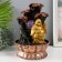 A desktop fountain with a “golden hotel from a tree with a fountain” 20.5x20x30 cm