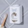 Mechanical “butterfly” toothpaste dispenser, 9.5 x 5.8 cm.