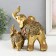 Souvenir Polystone "elephant and elephant in the blade with flower" Bronze 15x12.5x17.5 cm