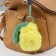 Fluffy on a ring with a carbine "Gray pear" 5.5x8x11.6 cm