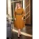 Female dress, size 60, mustard color
