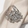 Ring for the scarf "flower" voluminous with rhinestones, white color in silver