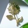 Brooch "Sunflower Flower" on the stem, colored in gold