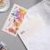 Money envelope "Congratulations!" glasses, roses,