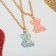 Kuulons Demetrotes "Choselka" marmalade bears, blue-pink color in gold