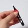 Pinzet begged, narrow, with a rubber insert, 9.5 cm, color mix