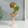 Polystone souvenir "Baby with tails, with plants in pots" 20.5x8x10.3 cm